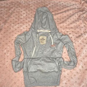Small gray Hollister crop top sweatshirt.